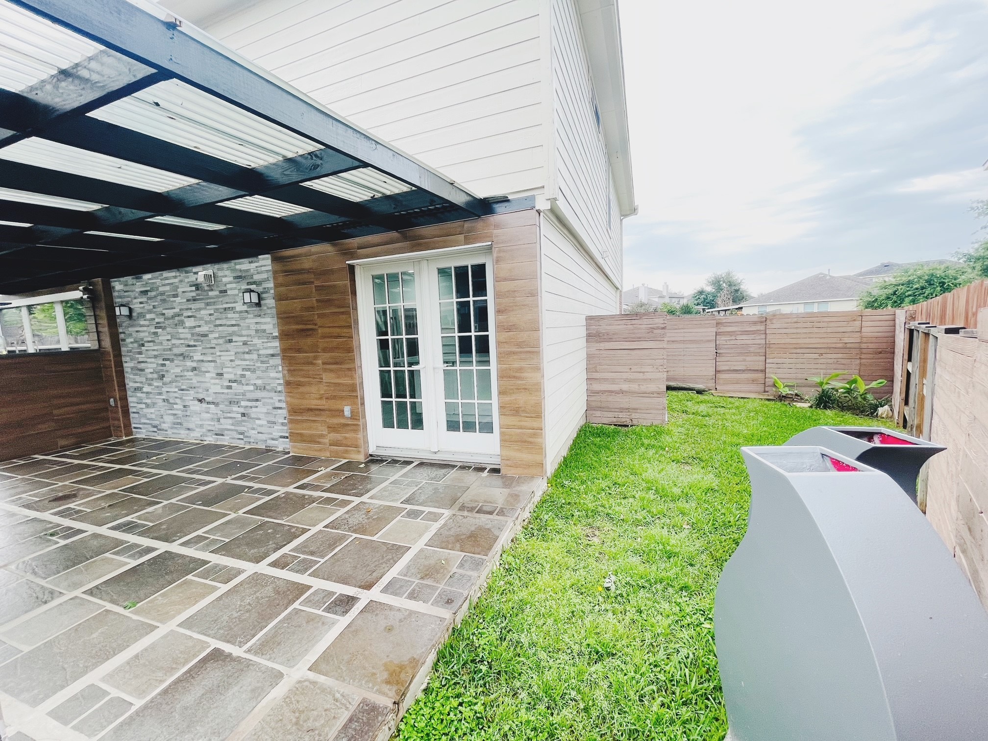19639 River Bottom Road Katy, TX 77449 - Photo 34 of 36 a view of a backyard with a garden
