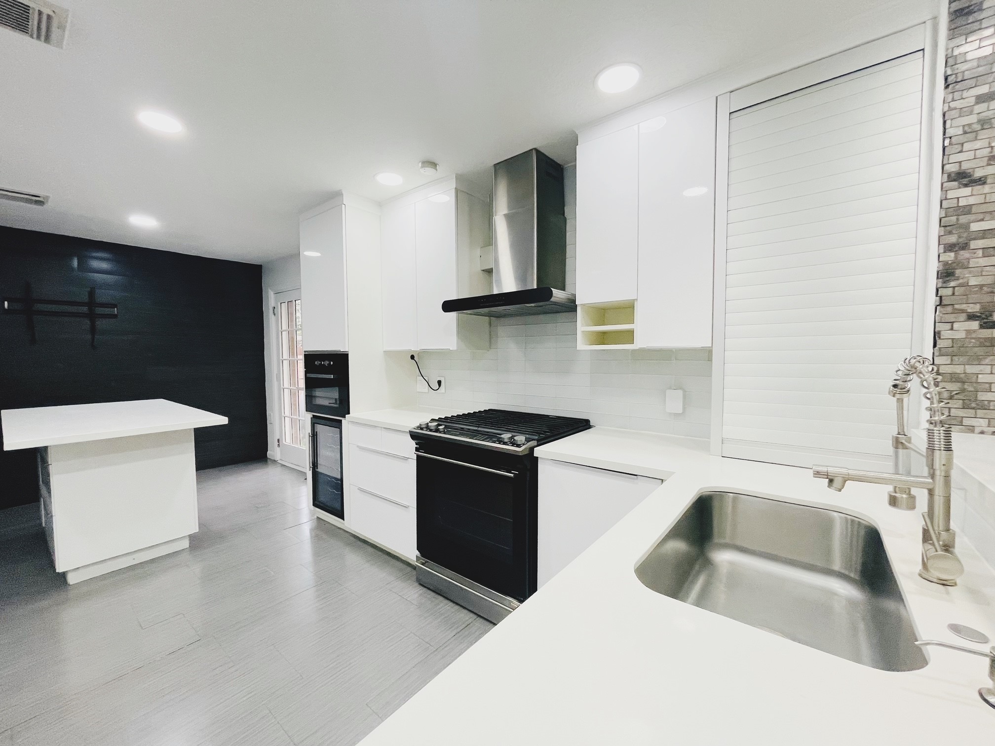19639 River Bottom Road Katy, TX 77449 - Photo 10 of 36 a kitchen with a sink stove and refrigerator