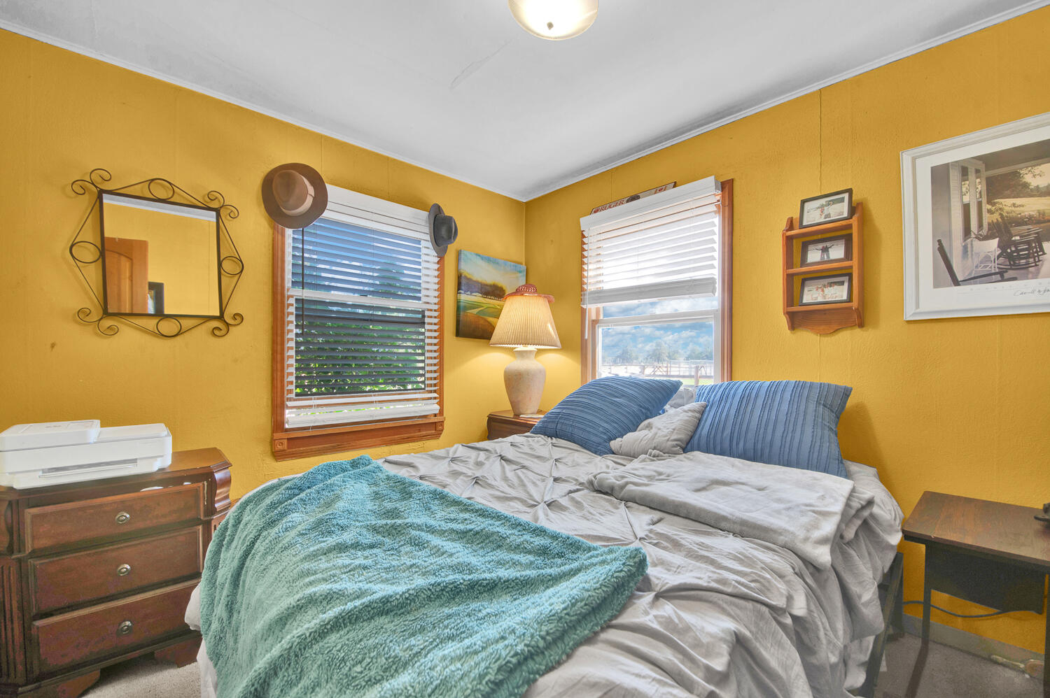 67100 Fryrear Road Bend, OR 97703 - Photo 15 of 38 a bedroom with a bed and a window