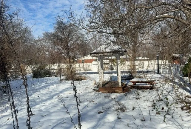 a view of a chairs and tables in the patio