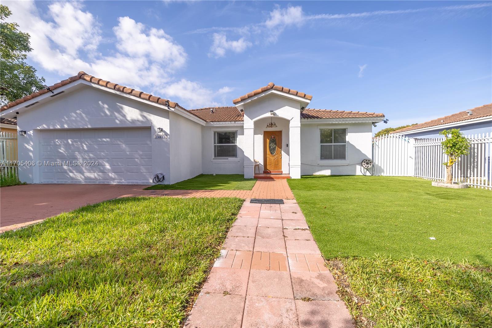 a front view of house with yard