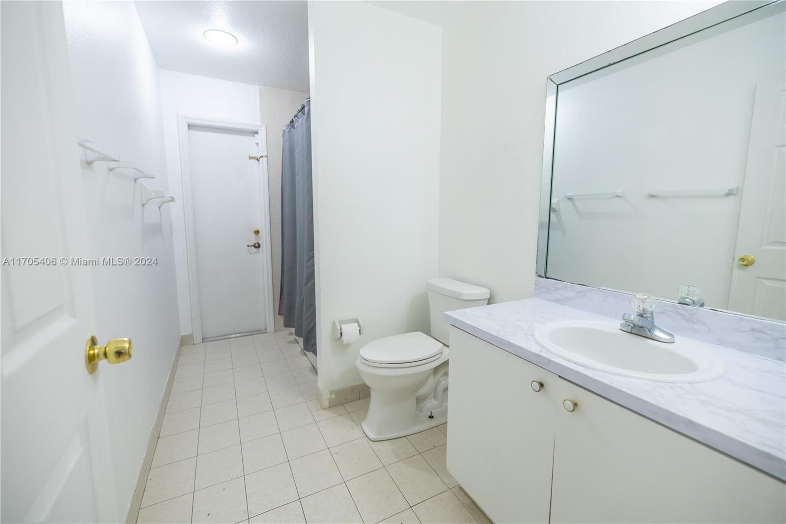 24622 Southwest 112th Court Homestead, FL 33032 - Photo 13 of 22 a bathroom with a sink toilet and shower