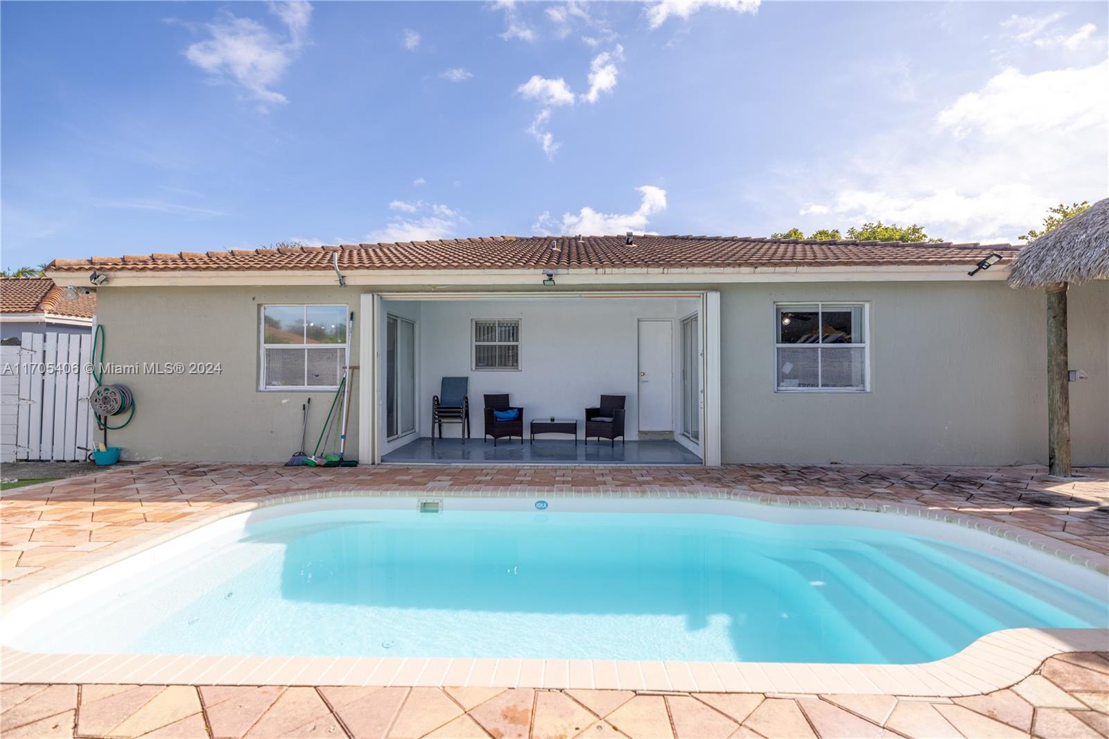 24622 Southwest 112th Court Homestead, FL 33032 - Photo 22 of 22 a view of a house with backyard and sitting area