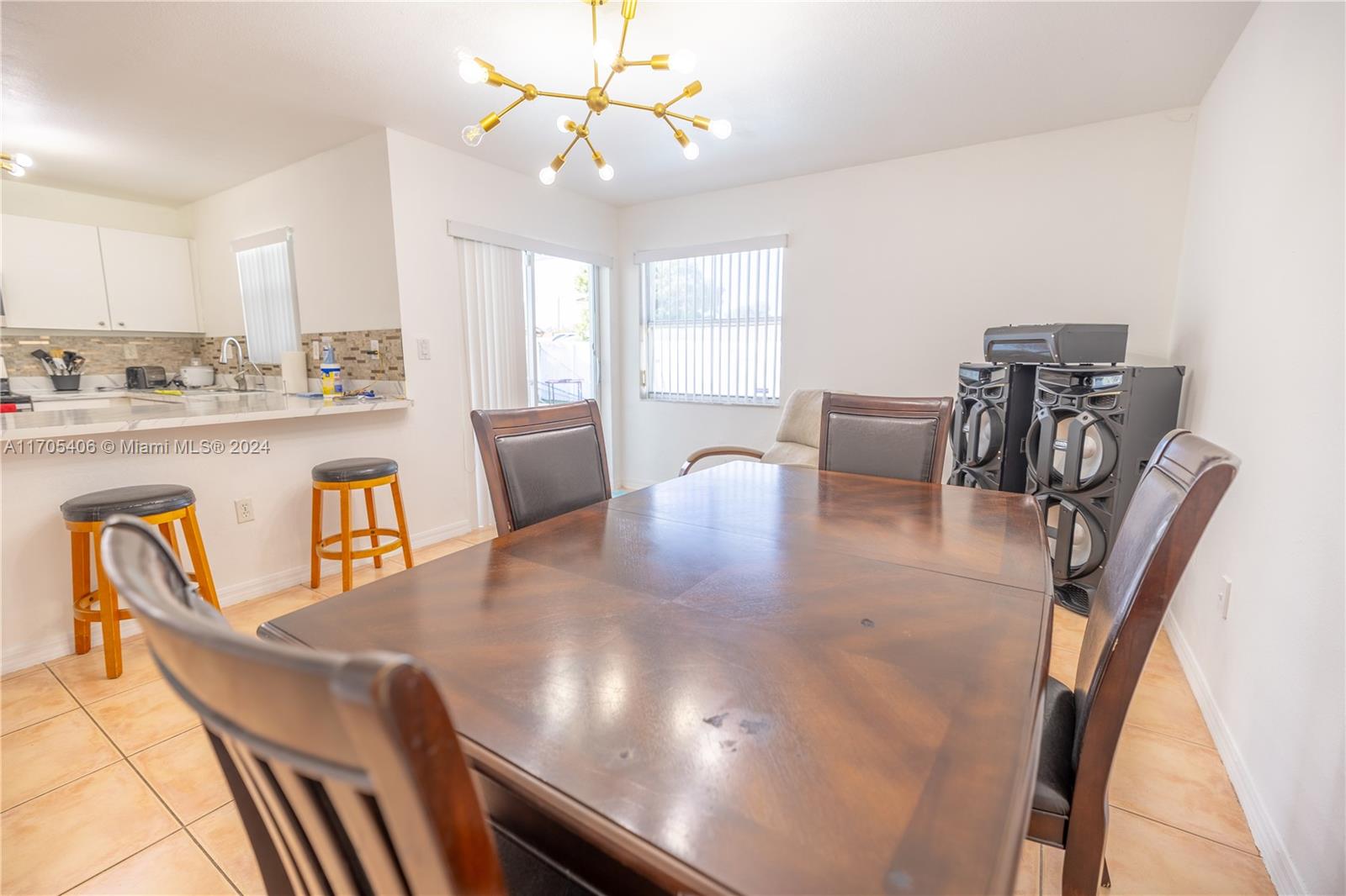 24622 Southwest 112th Court Homestead, FL 33032 - Photo 9 of 22 a view of a dining room with furniture window and outside view