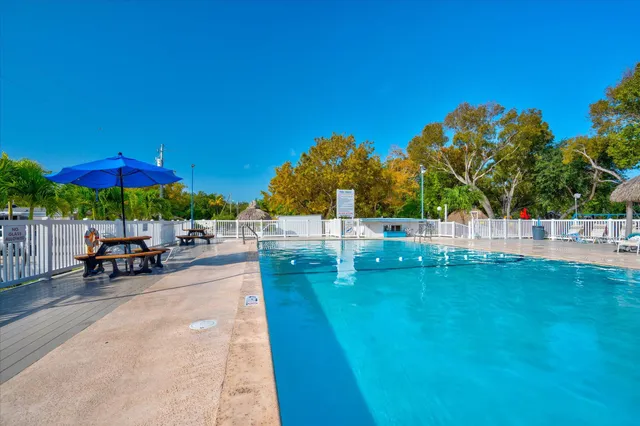 a view of a house with outdoor space and sitting area