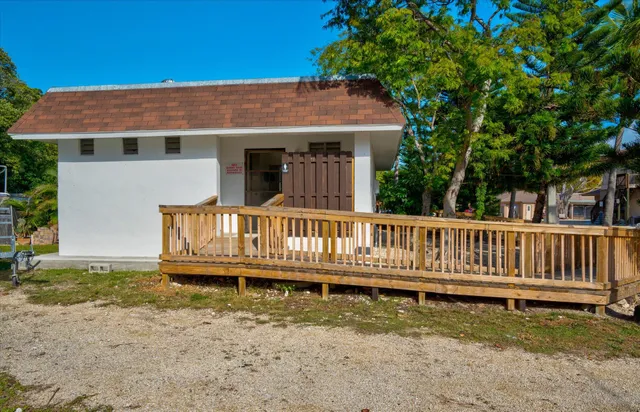a view of a swimming pool with an outdoor seating