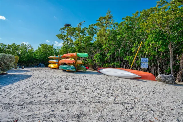 a view of a lake with sitting area