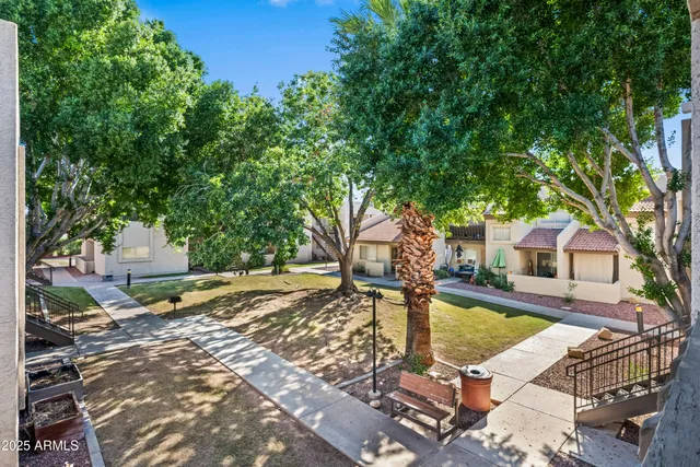 a view of a backyard with a patio