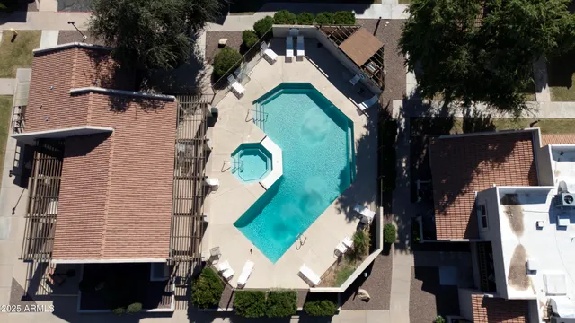 an aerial view of houses with yard
