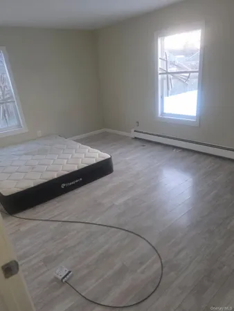 a bathroom with a shower and a toilet