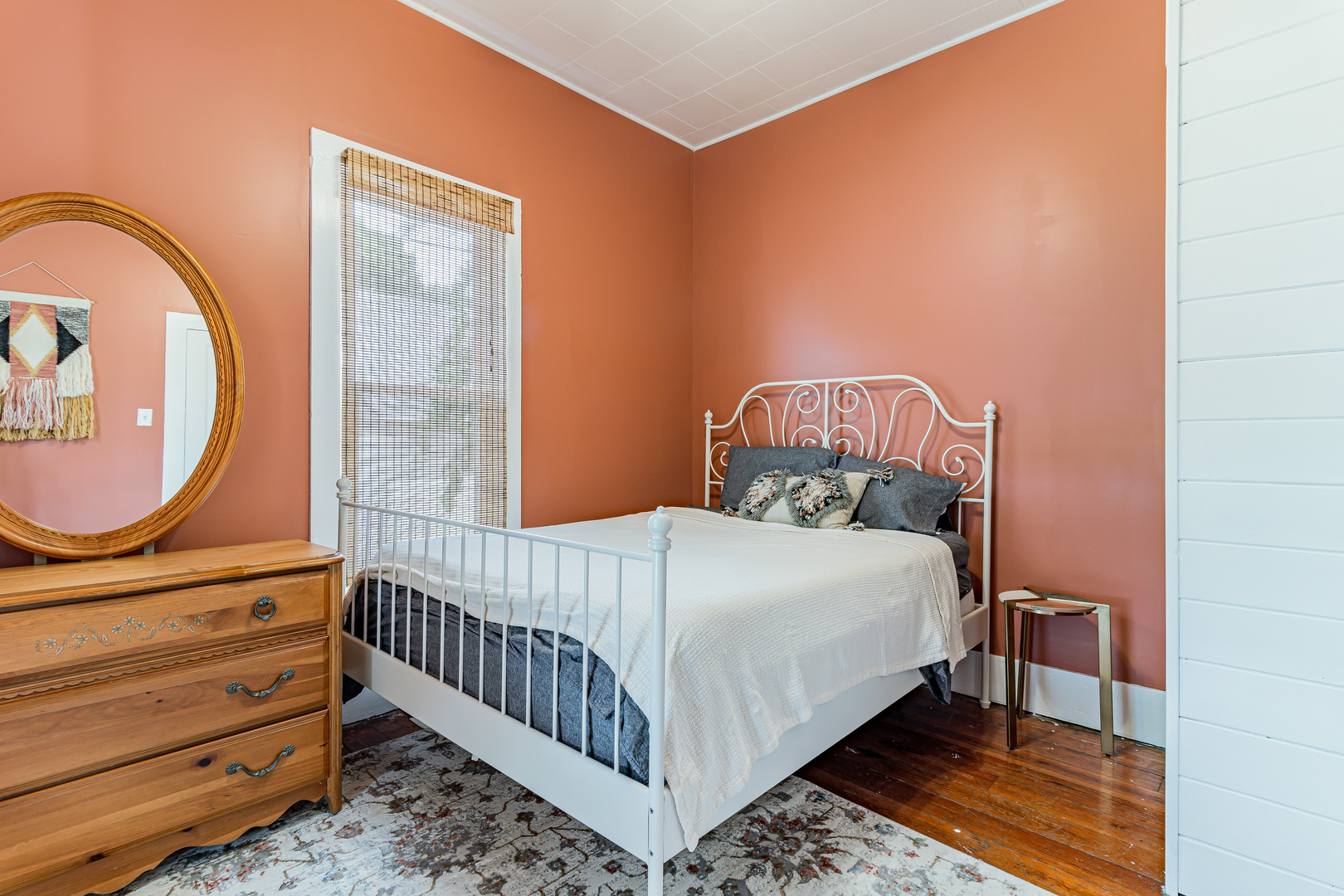 506 South Webber Street Urbana, IL 61801 - Photo 19 of 27 a bedroom with a bed a mirror and lamp on table