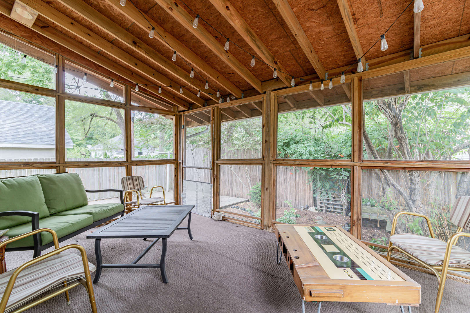 506 South Webber Street Urbana, IL 61801 - Photo 21 of 27 a living room with furniture and a large window