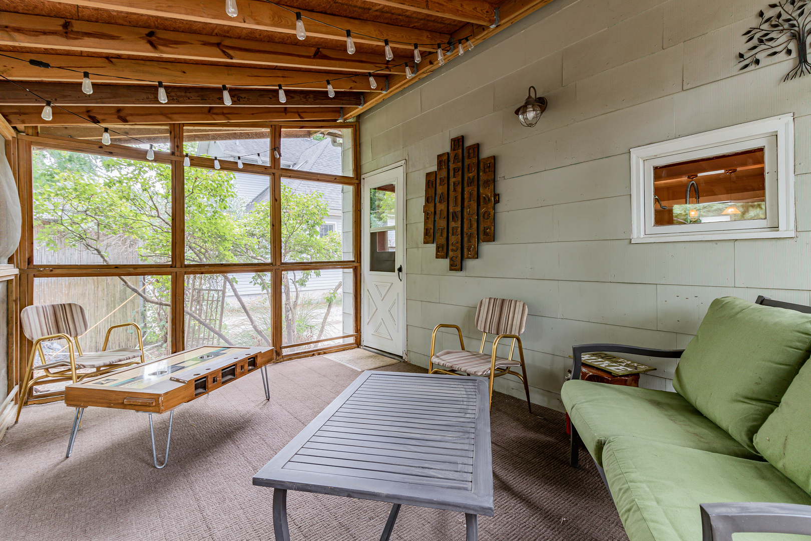 506 South Webber Street Urbana, IL 61801 - Photo 22 of 27 a balcony with furniture and a window