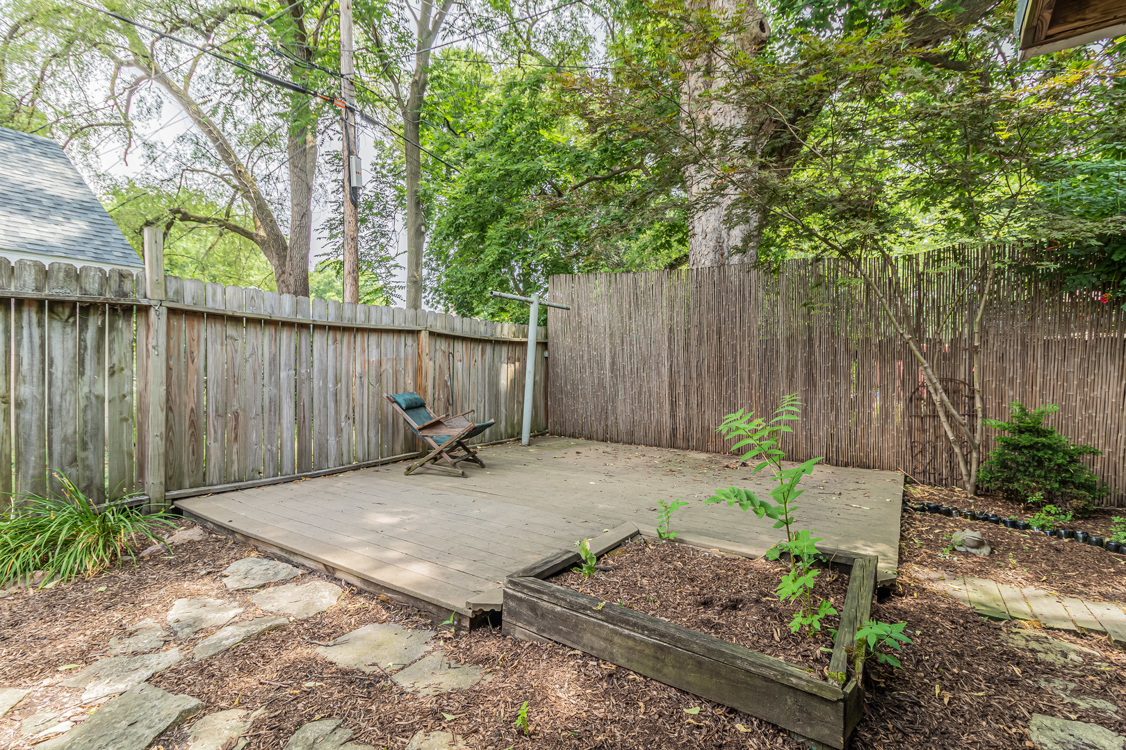 506 South Webber Street Urbana, IL 61801 - Photo 27 of 27 a backyard of a house with lots of green space