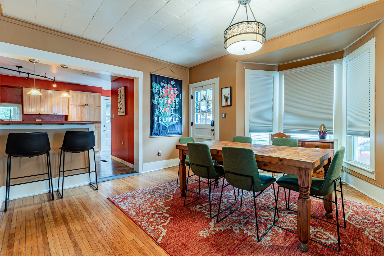 506 South Webber Street Urbana, IL 61801 - Photo 5 of 27 a view of a dining room with furniture window and wooden floor