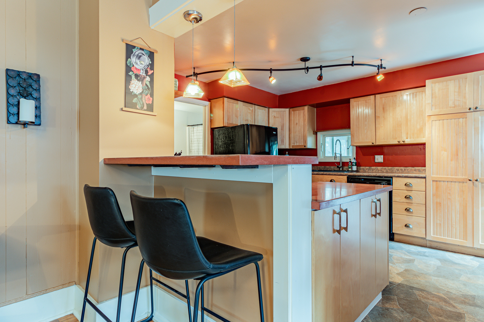 506 South Webber Street Urbana, IL 61801 - Photo 9 of 27 a kitchen with stainless steel appliances granite countertop a stove a sink and a microwave
