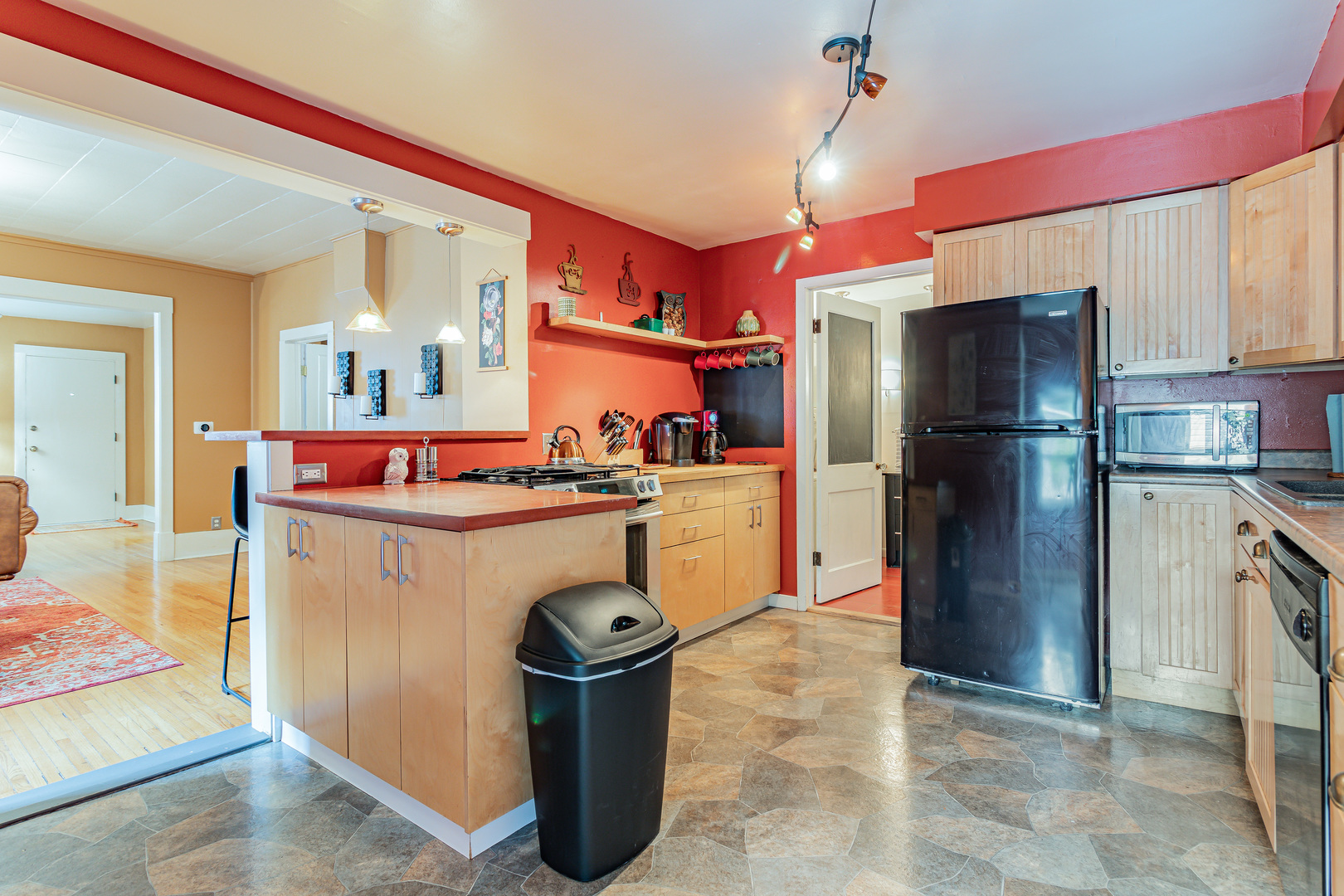 506 South Webber Street Urbana, IL 61801 - Photo 10 of 27 a kitchen with refrigerator and cabinets