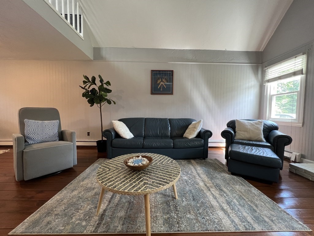12 State Road, Unit 2E Plymouth, MA 02360 - Photo 5 of 28 a living room with furniture and a couch