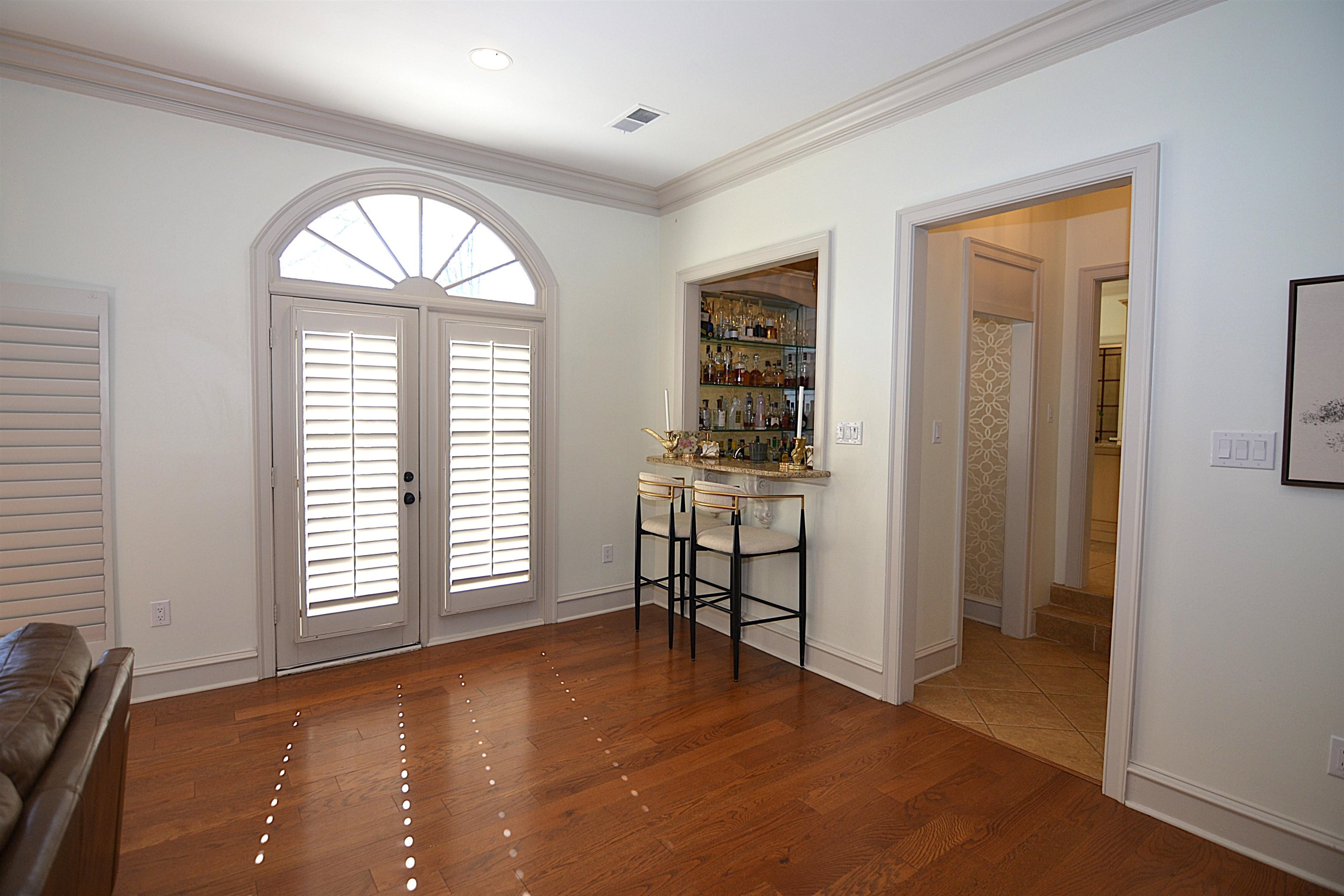 8723 Windrush Memphis, TN 38125 - Photo 19 of 40 This door exits to the large patio and pool area.