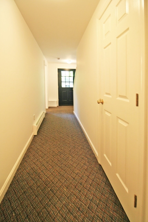 36 Torrey Street Easthampton, MA 01027 - Photo 17 of 20 a view of hallway with wooden floor