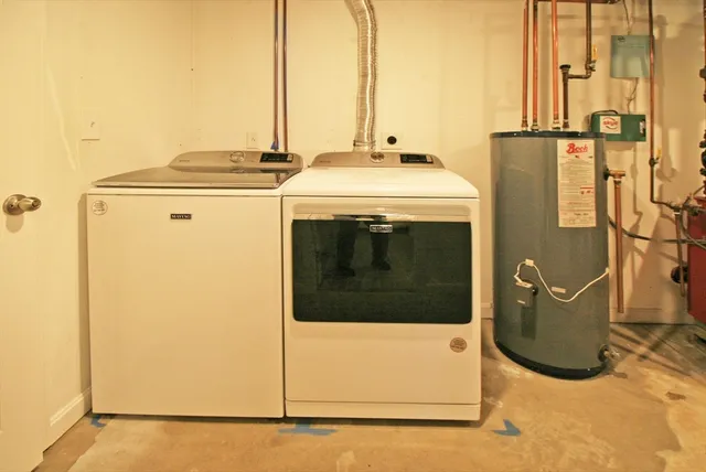 a utility room with dryer and washer
