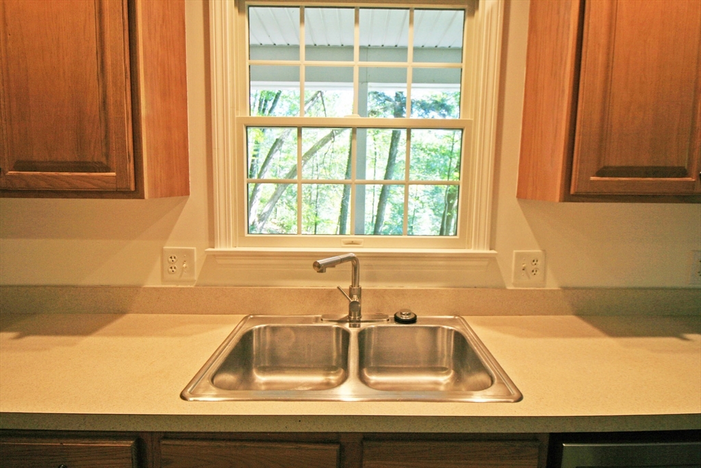 36 Torrey Street Easthampton, MA 01027 - Photo 5 of 20 a view of a sink and a window