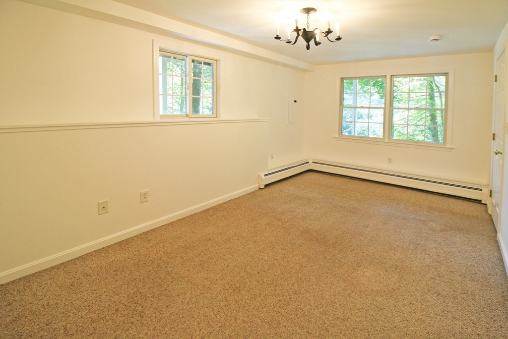 36 Torrey Street Easthampton, MA 01027 - Photo 7 of 20 an empty room with a window