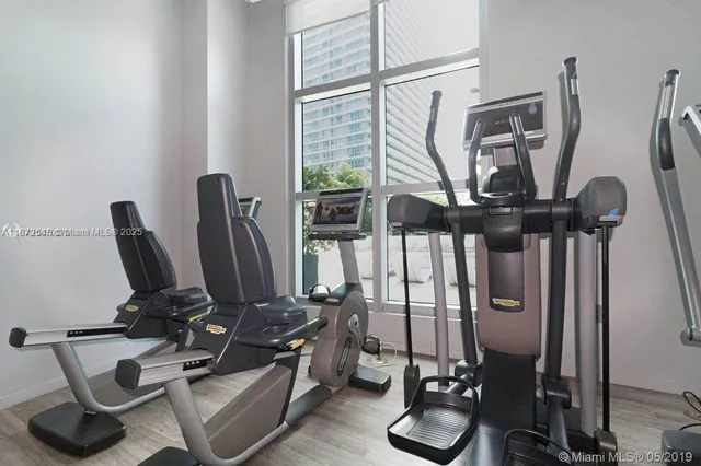 a view of a workspace with gym equipment