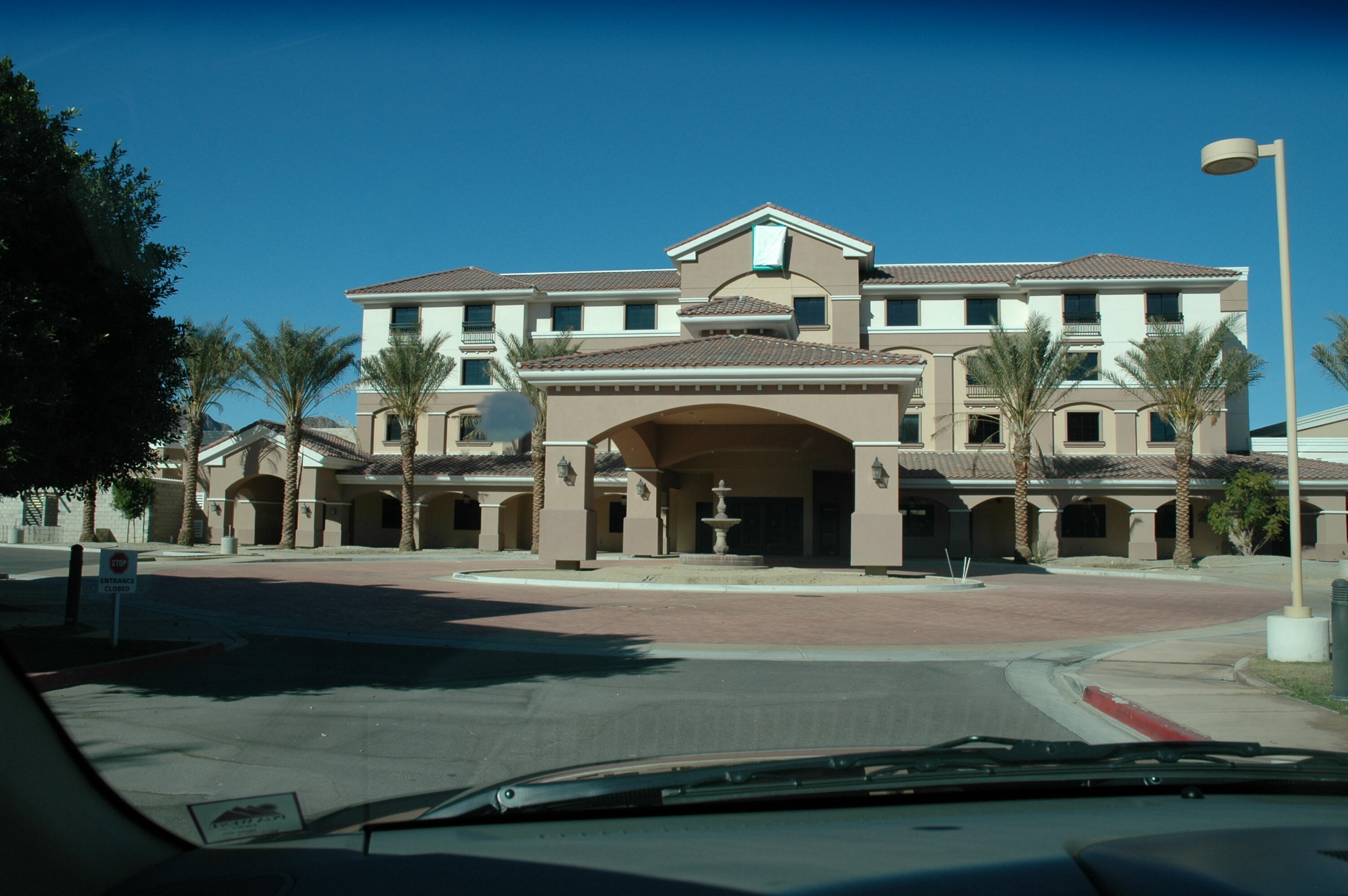 50740 Santa Rosa Plaza, Unit 5 La Quinta, CA 92253 - Photo 13 of 17 a view of a building with street view
