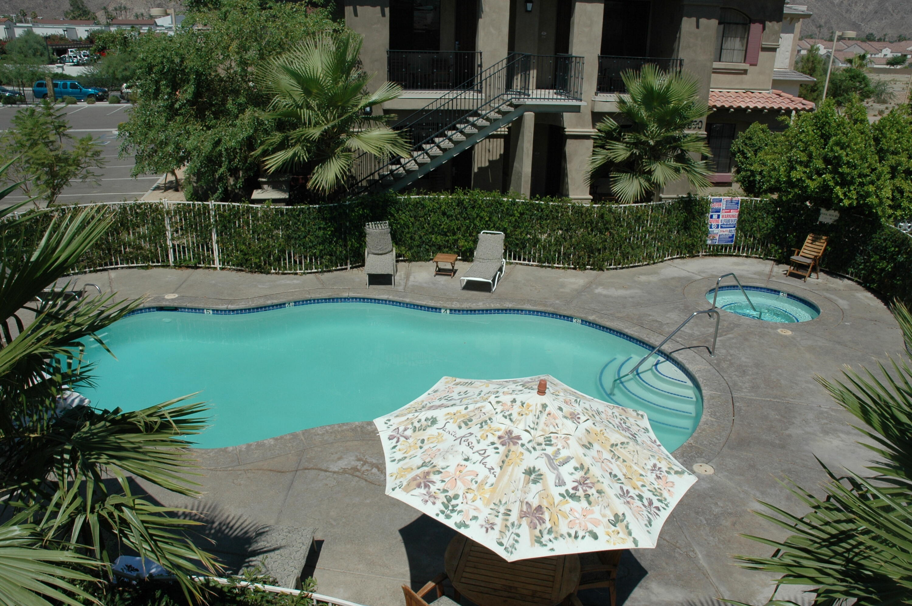 50740 Santa Rosa Plaza, Unit 5 La Quinta, CA 92253 - Photo 15 of 17 an aerial view of a house having yard