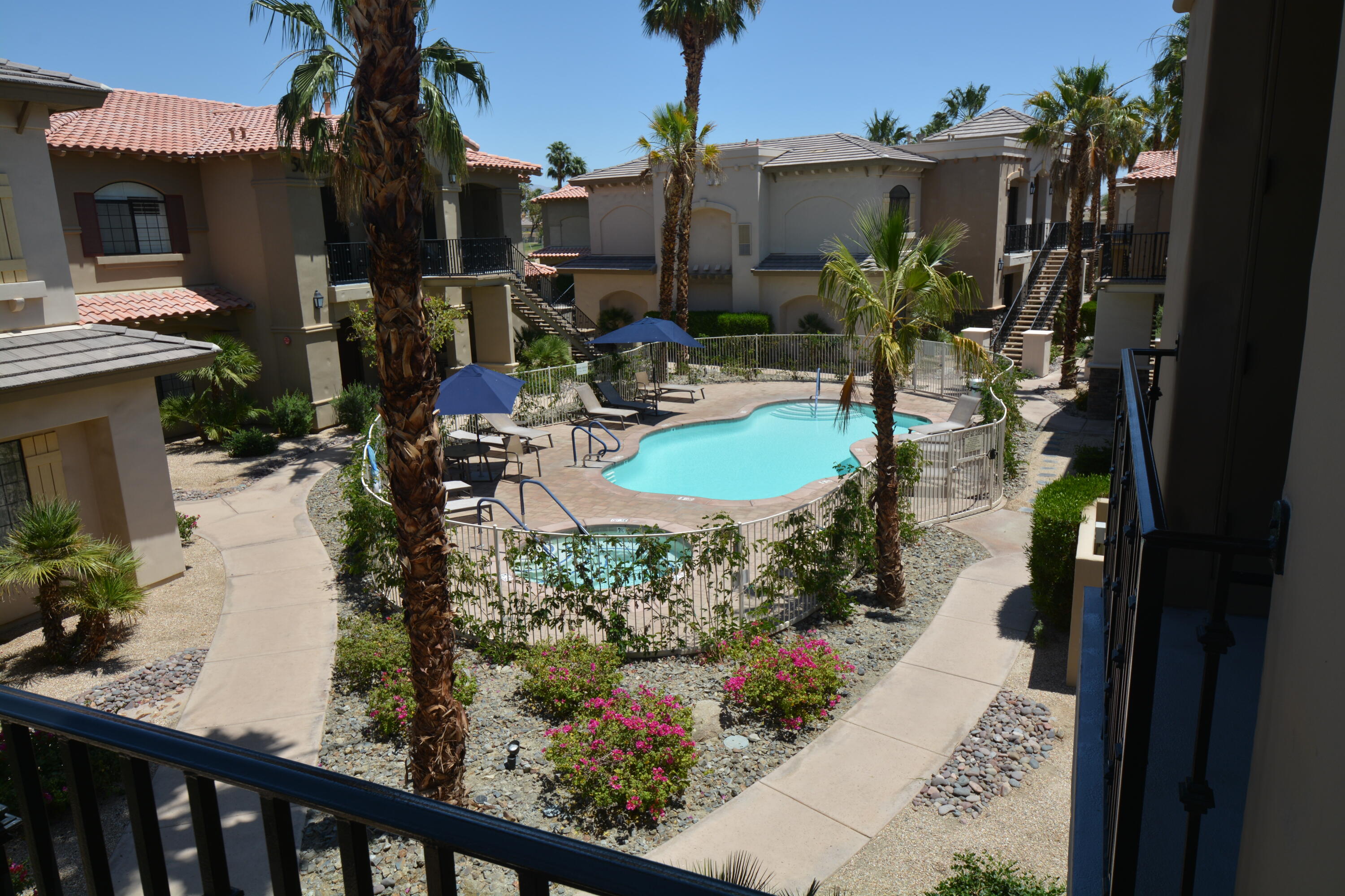 50740 Santa Rosa Plaza, Unit 5 La Quinta, CA 92253 - Photo 4 of 17 a view of swimming pool from a balcony