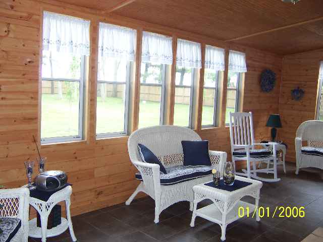 6629 Riverview Road Thomson, IL 61285 - Photo 9 of 9 a living room with furniture and a large window