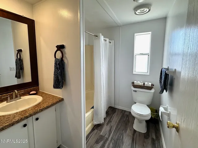 an empty room with a empty space and windows