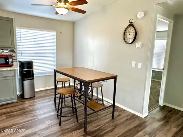 a bedroom with a bed and a table