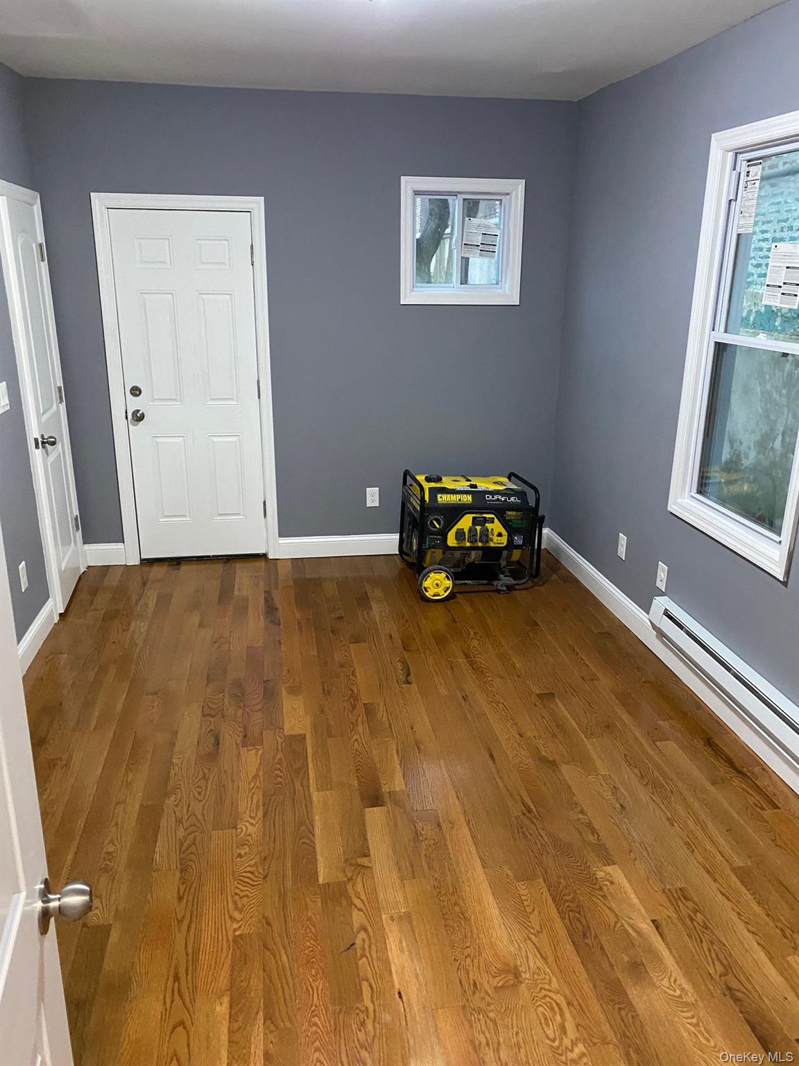 Undisclosed Address Mount Vernon, NY 10553 - Photo 10 of 20 a bedroom with a bed and a window
