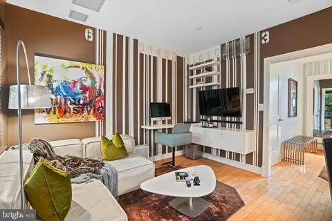 a living room with furniture and a table