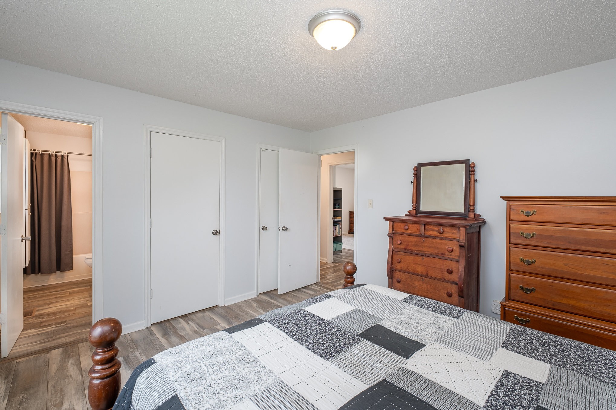 3134 Greens Mill Road Spring Hill, TN 37174 - Photo 14 of 20 a bedroom with a bed and a dresser