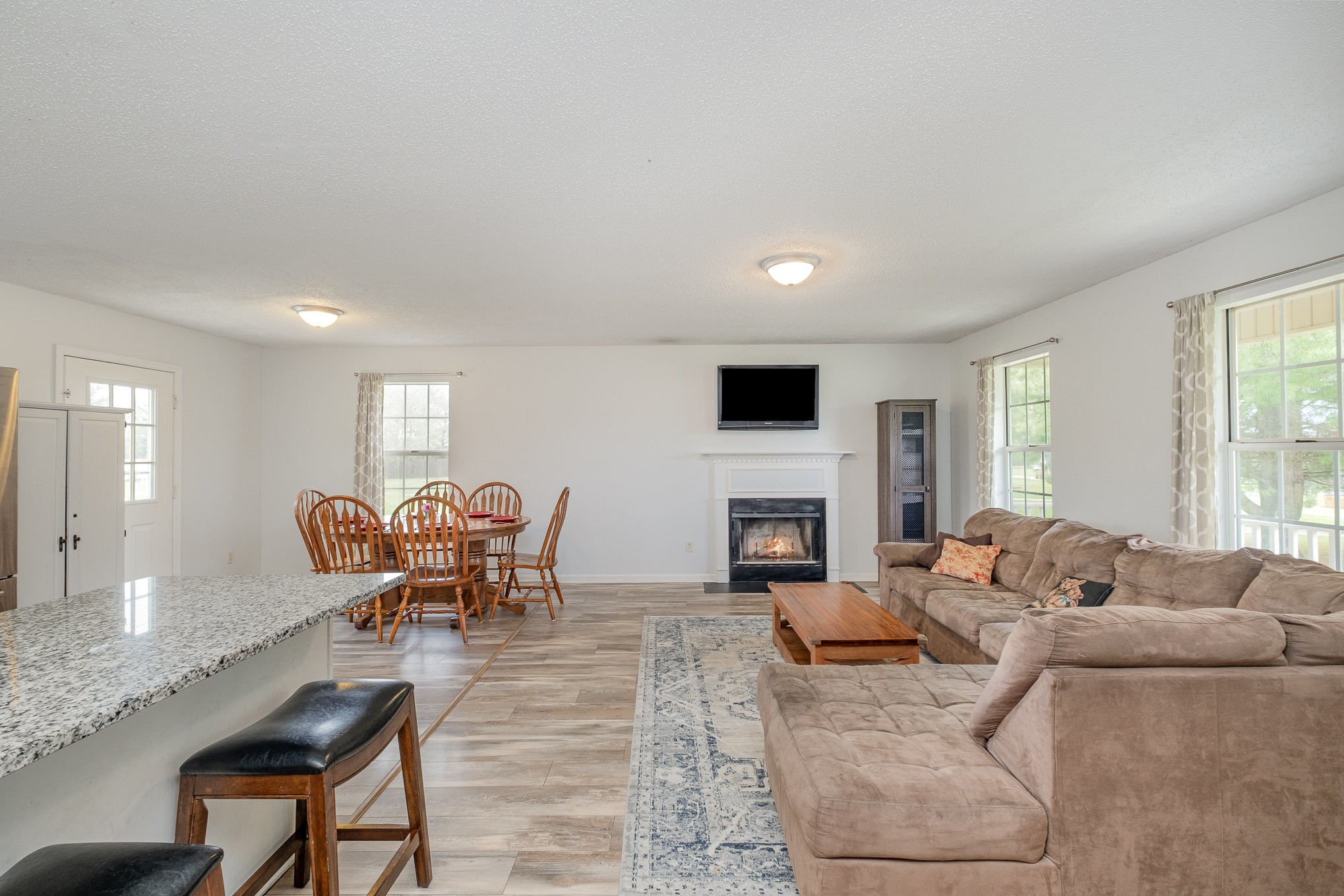 3134 Greens Mill Road Spring Hill, TN 37174 - Photo 6 of 20 a living room with furniture and a fireplace