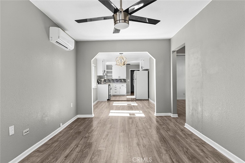 224 South Jackson Street Red Bluff, CA 96080 - Photo 15 of 44 a view of a hallway view with wooden floor and staircase