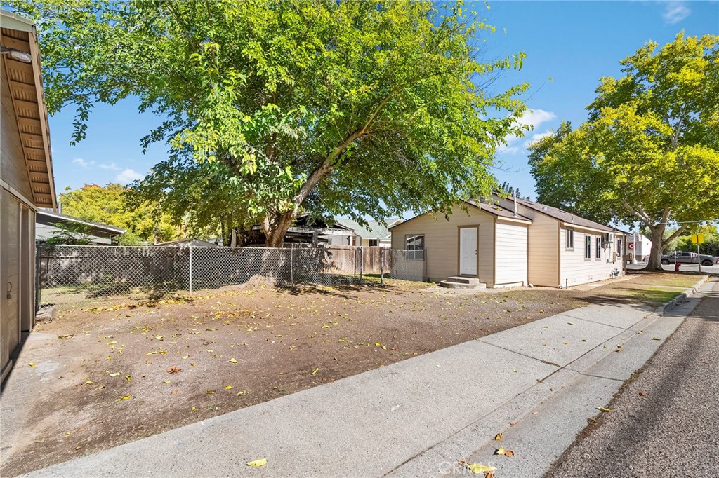224 South Jackson Street Red Bluff, CA 96080 - Photo 31 of 44 a white house that has tree in front of it