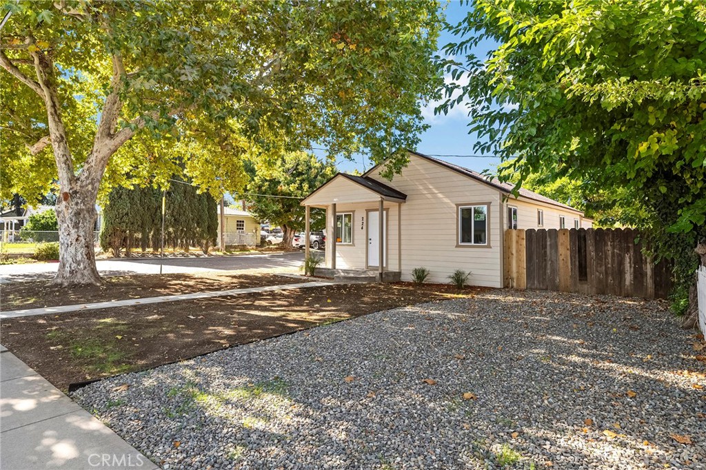 224 South Jackson Street Red Bluff, CA 96080 - Photo 37 of 44 a front view of a house with a yard and garage