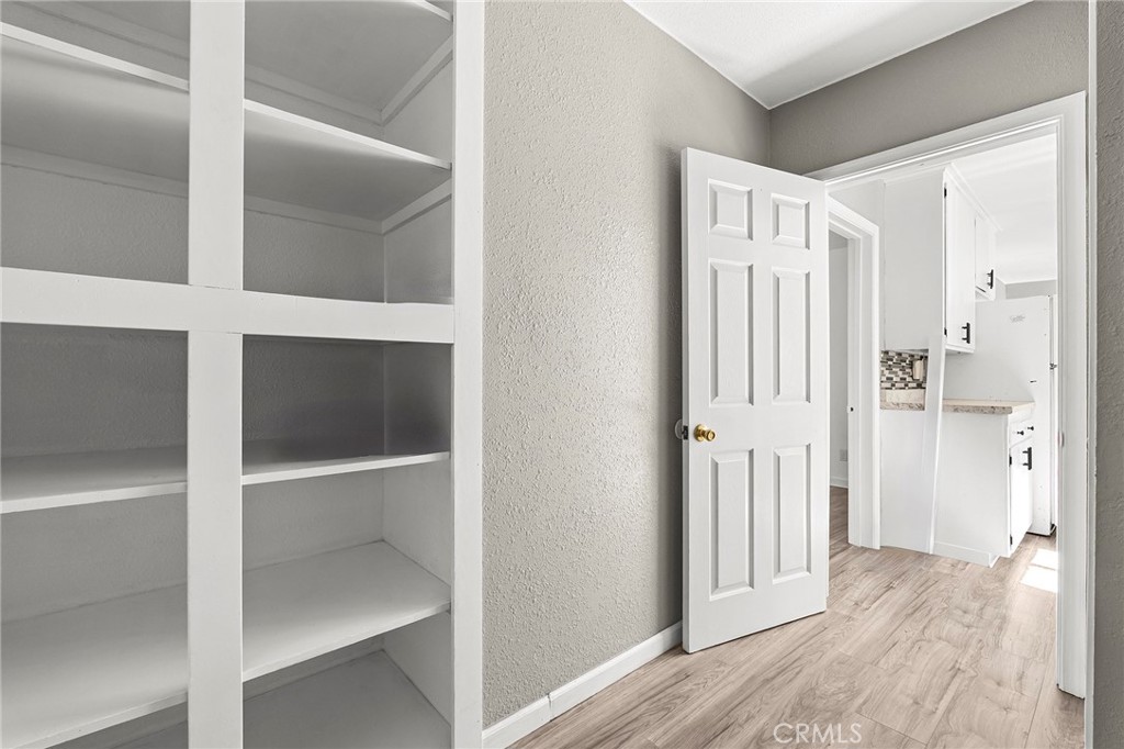 224 South Jackson Street Red Bluff, CA 96080 - Photo 10 of 44 a view of a hallway with wooden floor and entryway