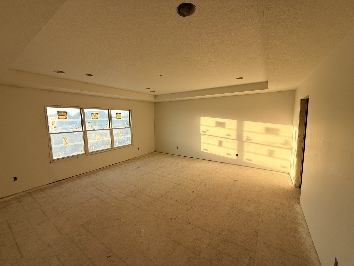 6414 Pelican Street Bettendorf, IA 52722 - Photo 12 of 57 a view of an empty room with a window