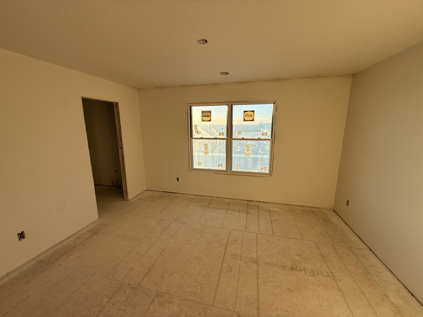 6414 Pelican Street Bettendorf, IA 52722 - Photo 16 of 57 an empty room with windows