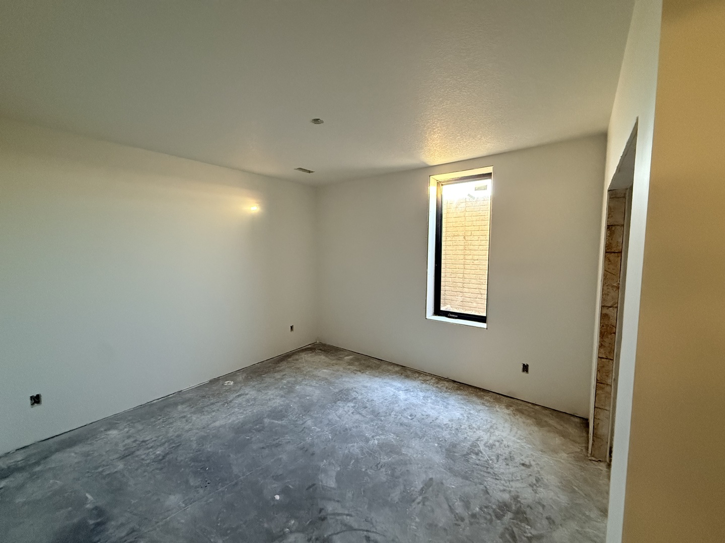 6414 Pelican Street Bettendorf, IA 52722 - Photo 20 of 57 an empty room with a empty space and windows