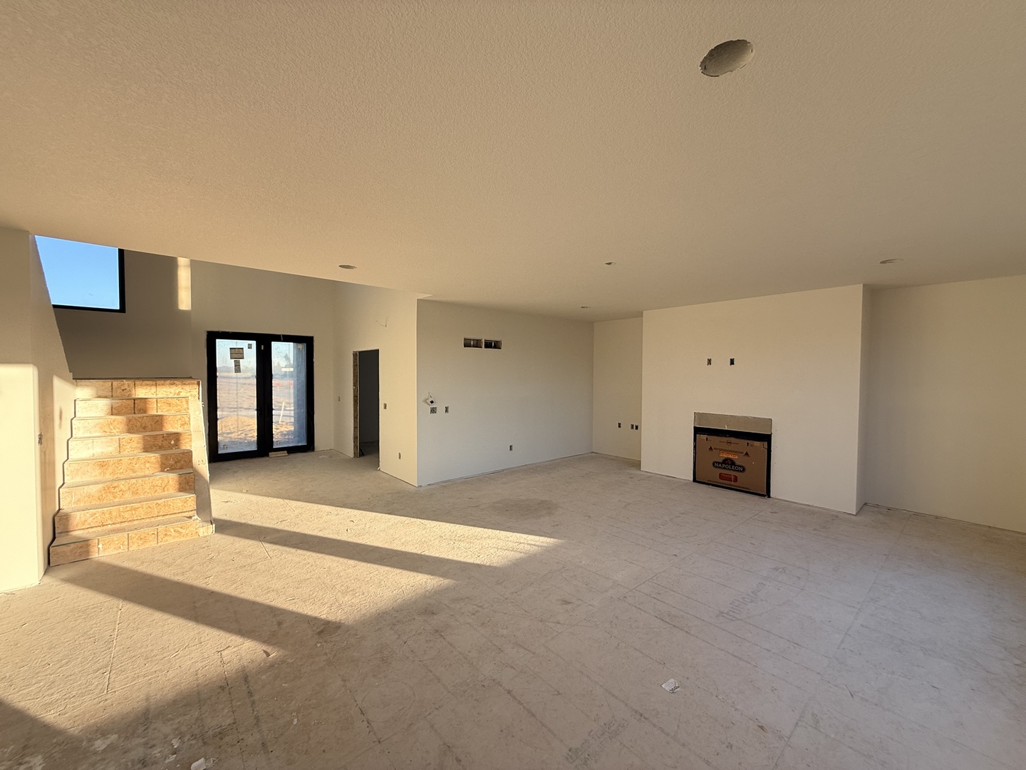 6414 Pelican Street Bettendorf, IA 52722 - Photo 5 of 57 a view of an empty room with a fireplace