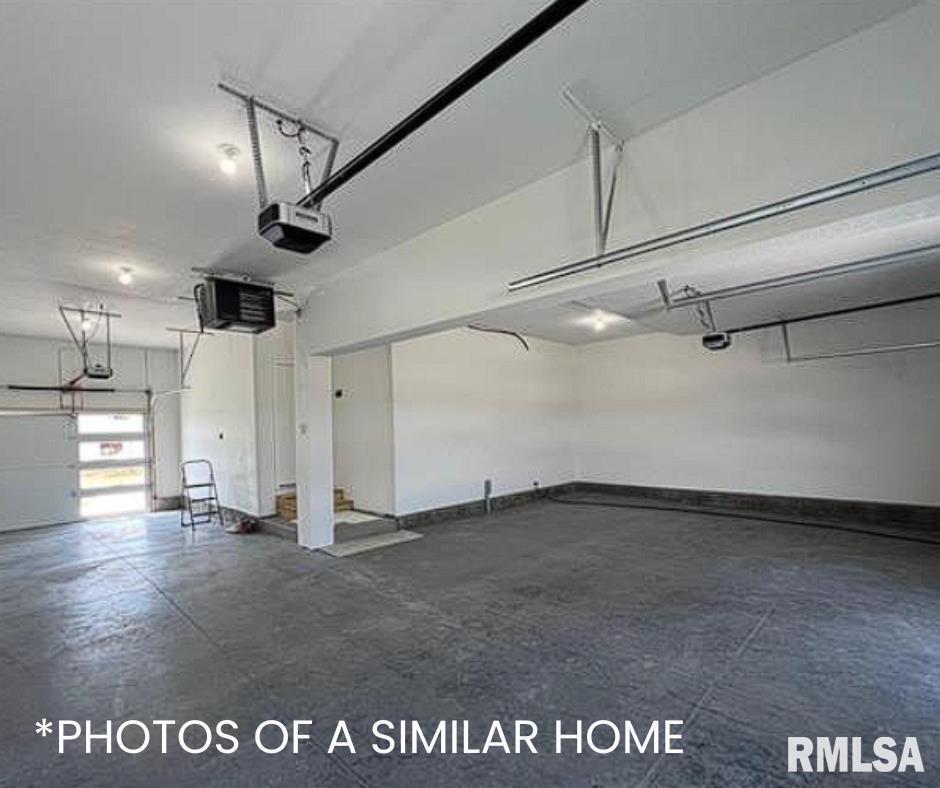 6414 Pelican Street Bettendorf, IA 52722 - Photo 55 of 57 a view of a garage