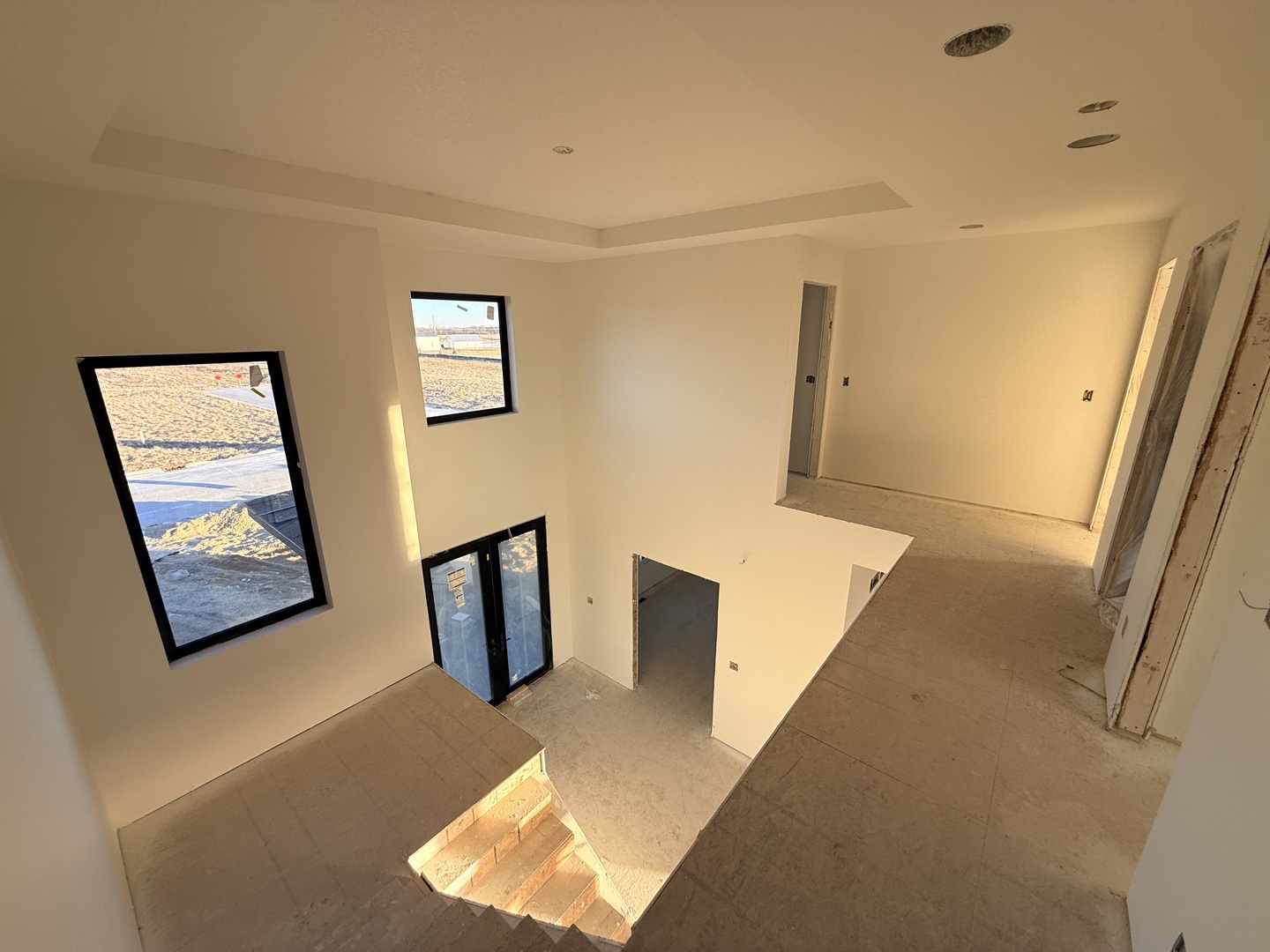 6414 Pelican Street Bettendorf, IA 52722 - Photo 9 of 57 a view of an empty room and wooden floor