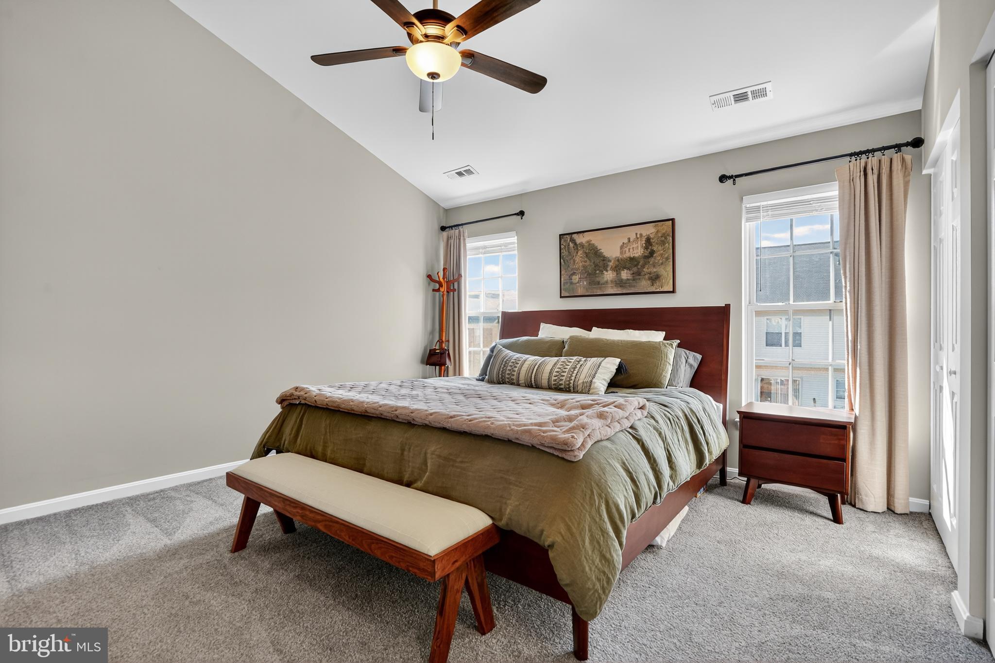 45445 Timber Trail Square Sterling, VA 20164 - Photo 13 of 38 a bedroom with a bed and a chandelier