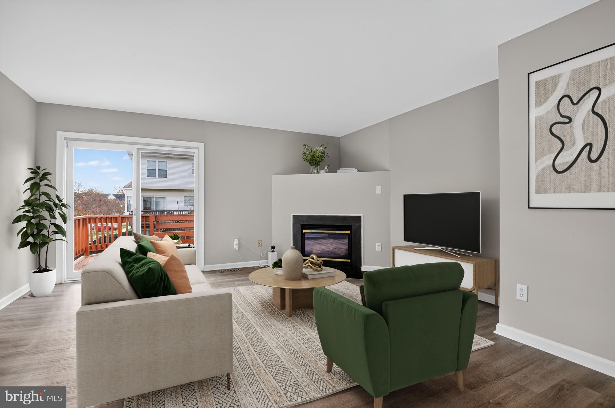45445 Timber Trail Square Sterling, VA 20164 - Photo 3 of 38 a living room with furniture and a fireplace